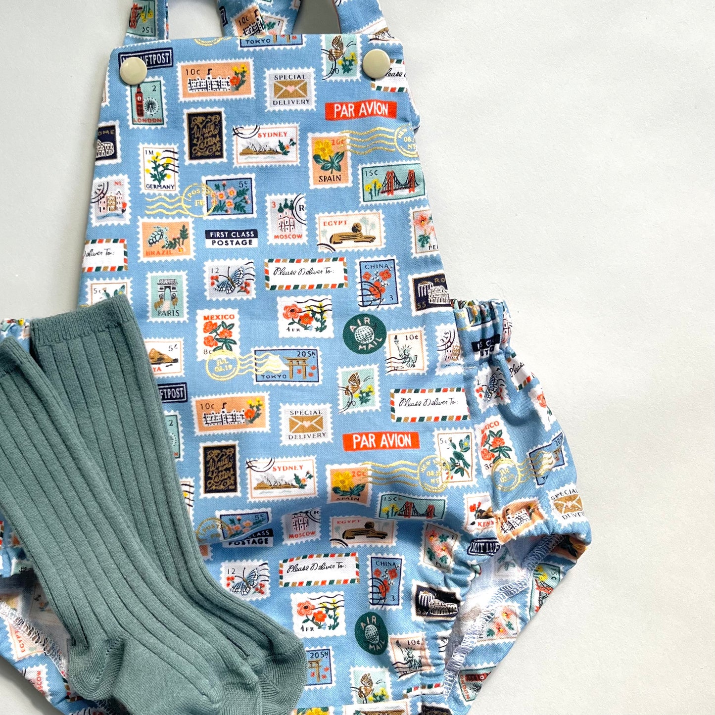 WORLD TRAVELLER SHORT ROMPER in SKY