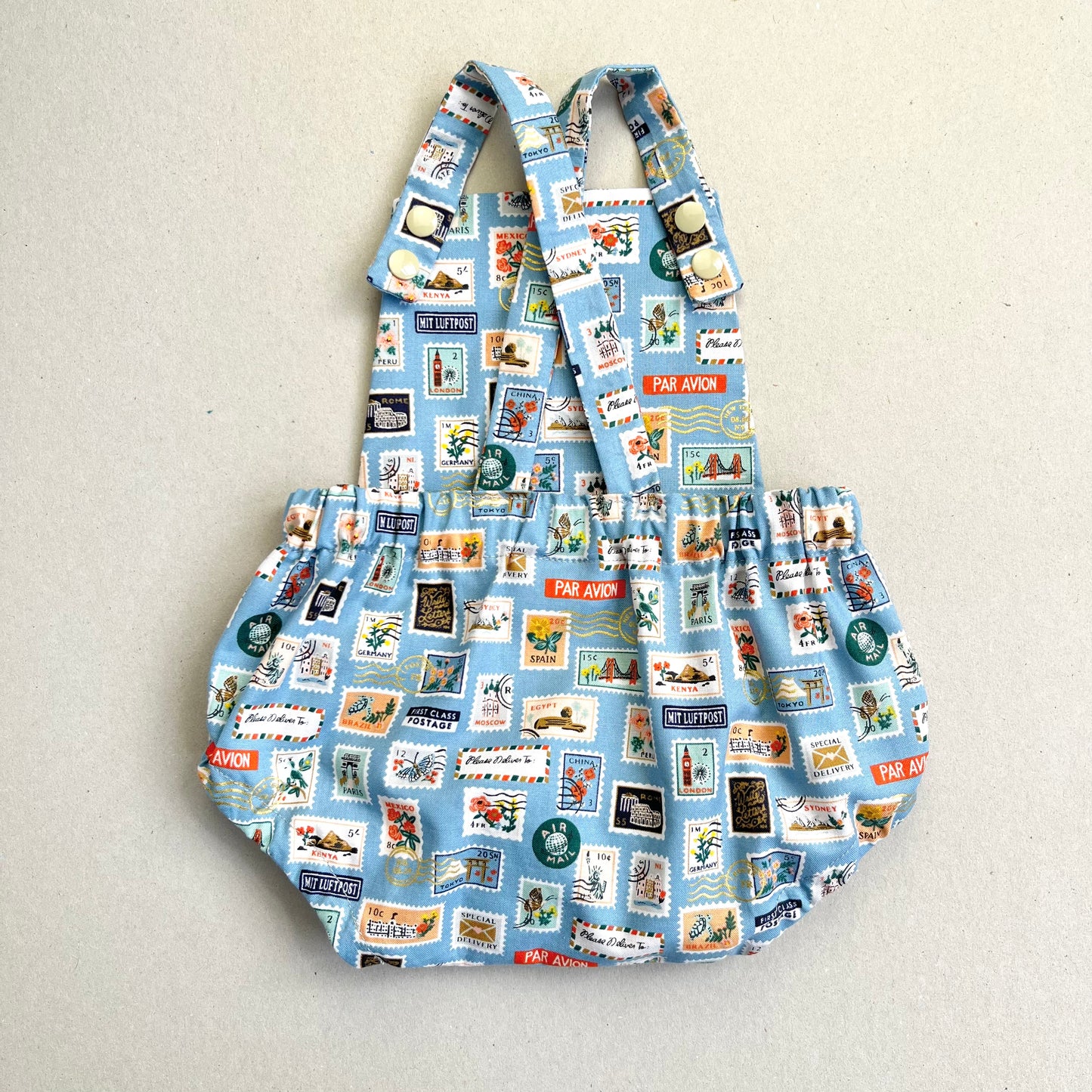 WORLD TRAVELLER SHORT ROMPER in SKY