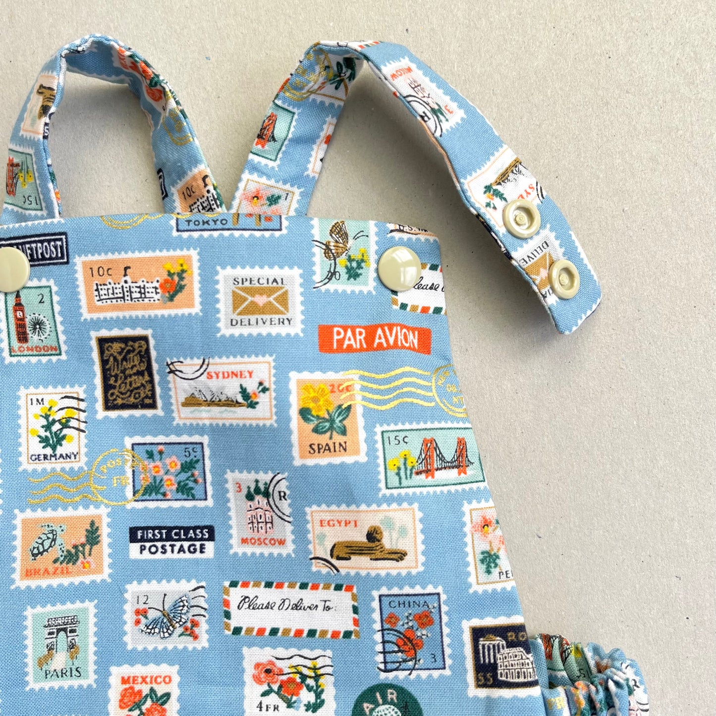 WORLD TRAVELLER SHORT ROMPER in SKY