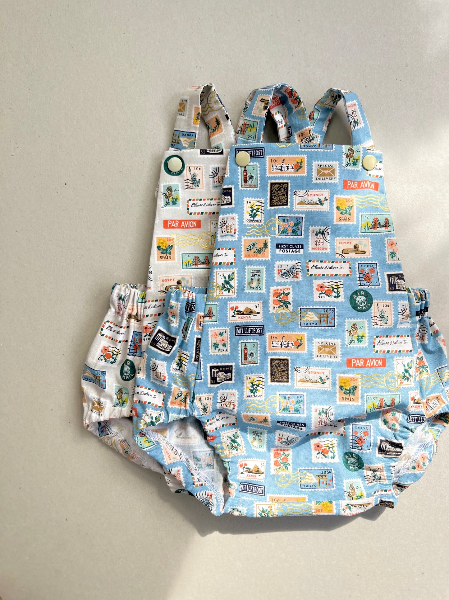 WORLD TRAVELLER SHORT ROMPER in SKY