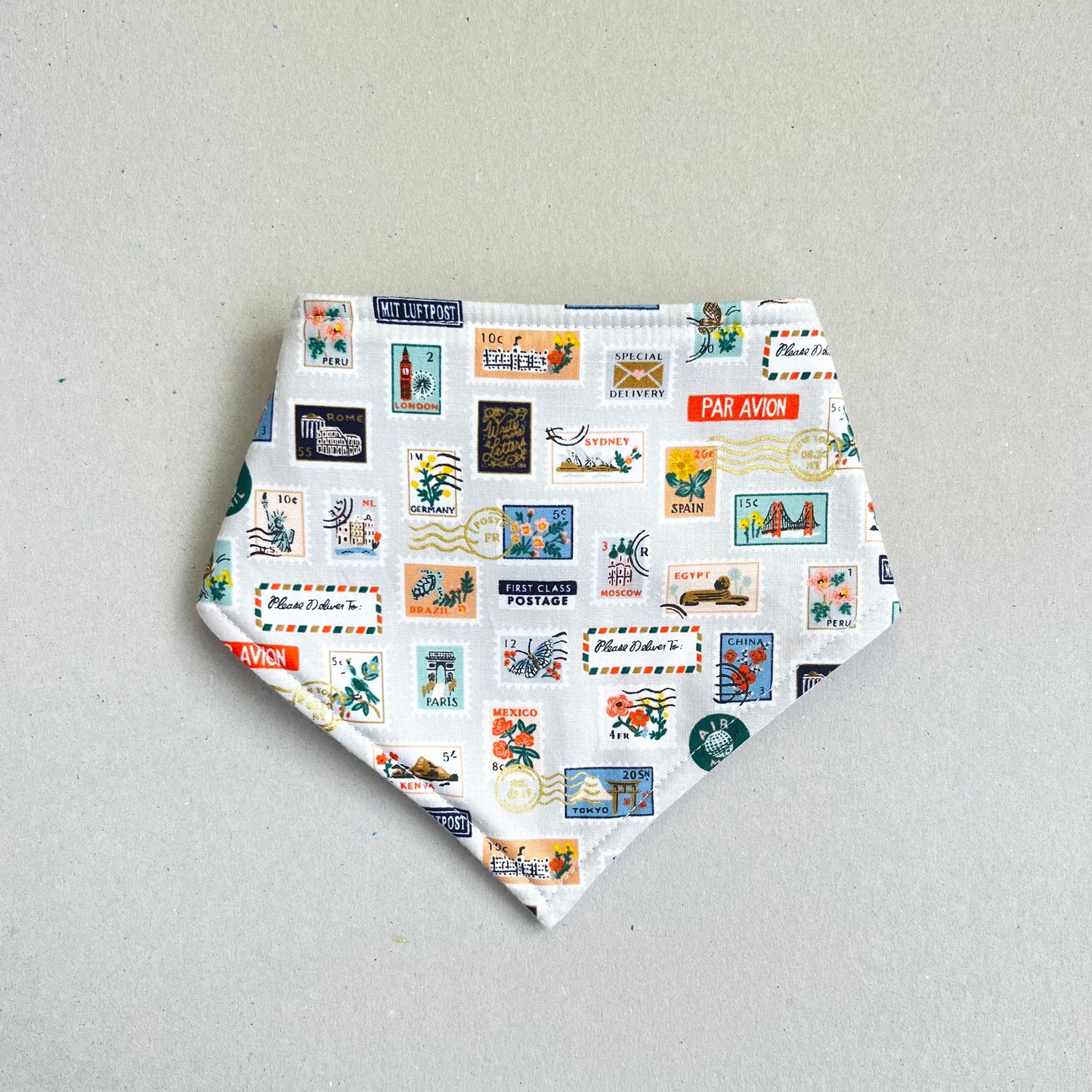 WORLD TRAVELLER BANDANA BIB in STONE