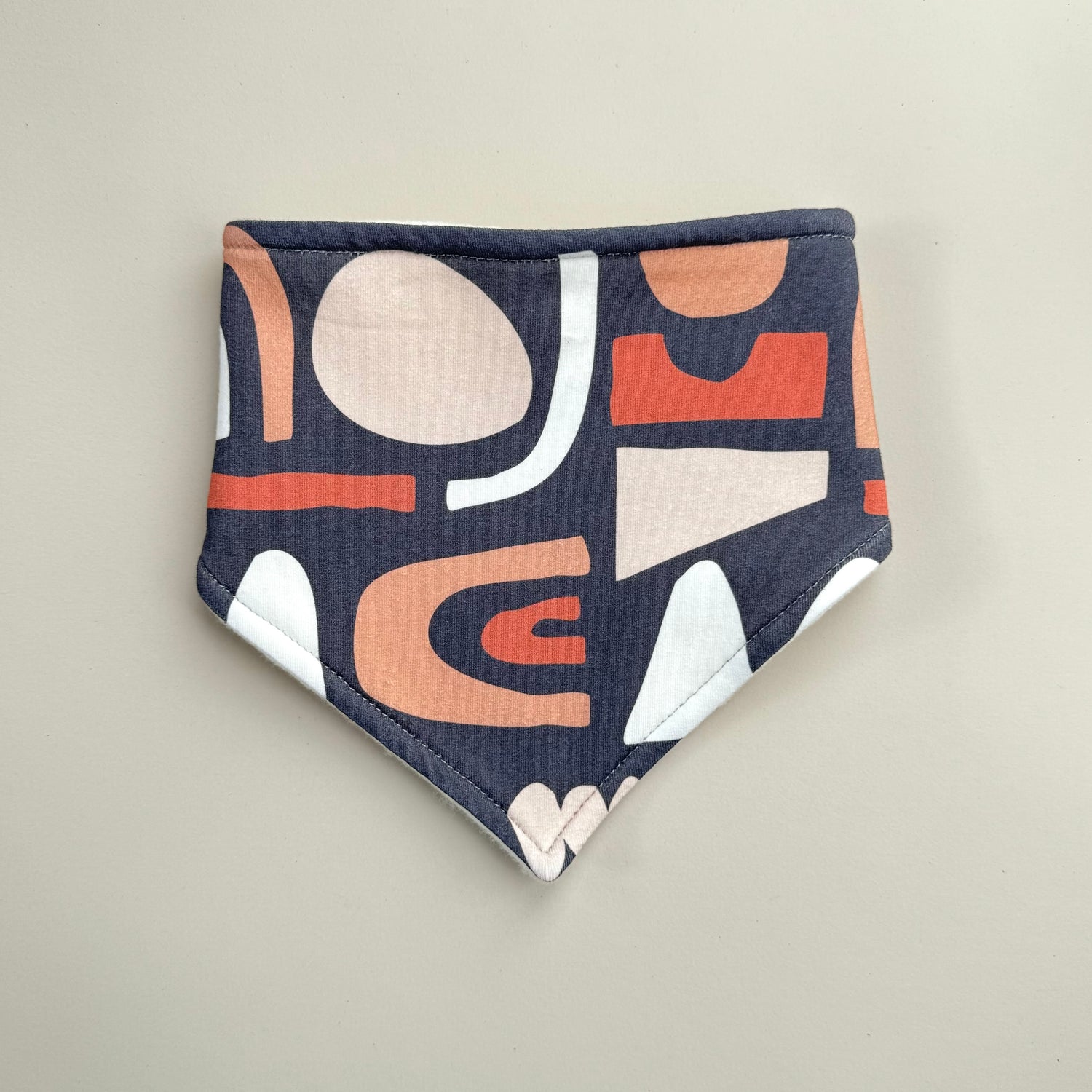 Navy blue patterned bandana bib handmade in the UK 