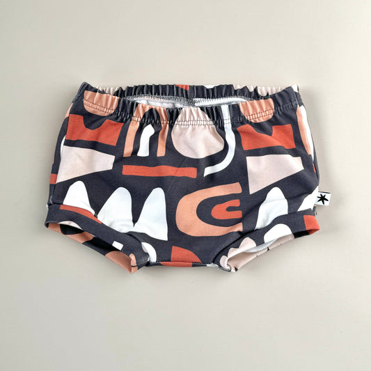 Toybox print kids shorts handmade by Emma Neale in the UK