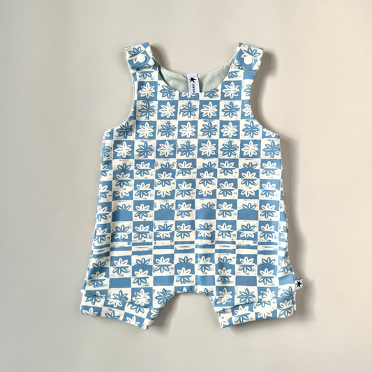 Blue and white check floral organic baby romper for summer handmade in the UK Emma Neale Handmade