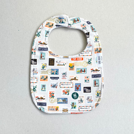 WORLD TRAVELLER TRADITIONAL BIB in STONE
